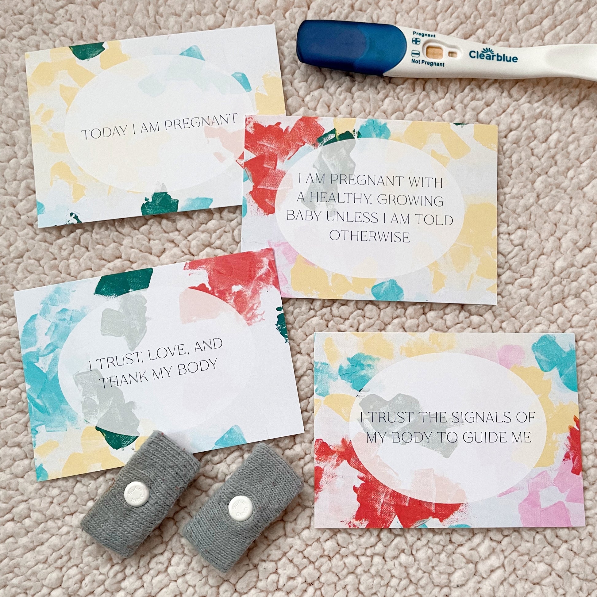 pregnancy affirmation cards with colorful abstract art