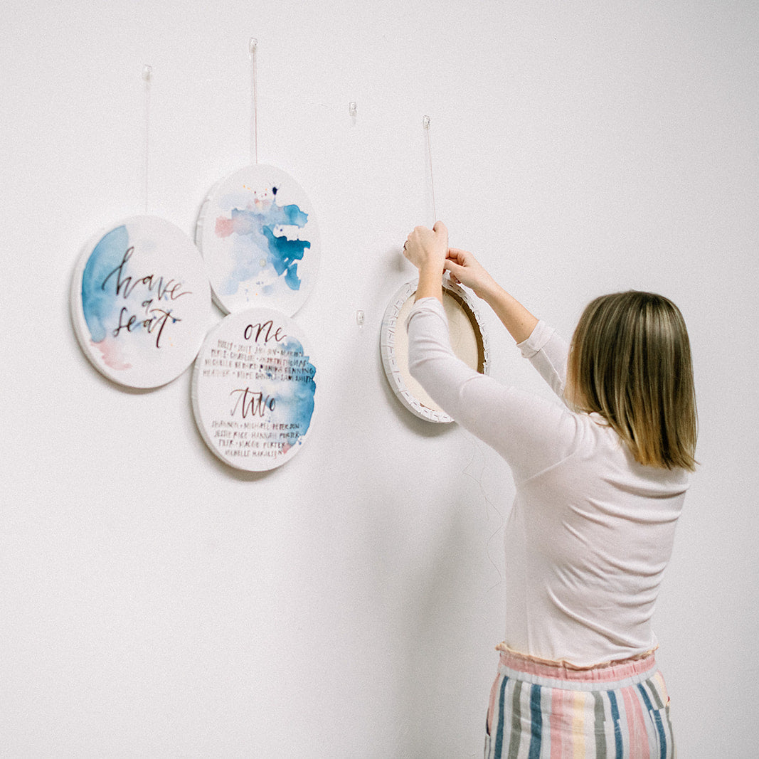 Hanging watercolor canvas wedding seating chart